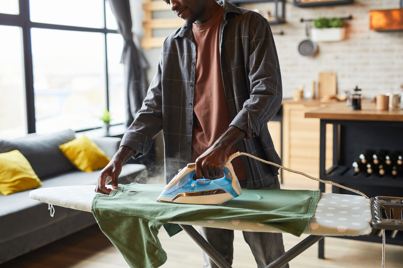 Man Ironing Clothes